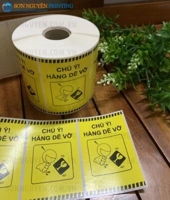 Một mẫu tem cảnh báo dán thùng phổ biến trên thị trường